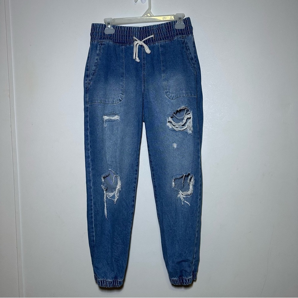 Celebrity Pink Distressed Denim Jogger Jeans
Size Medium